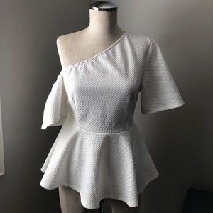 All white one shoulder peplum blouse